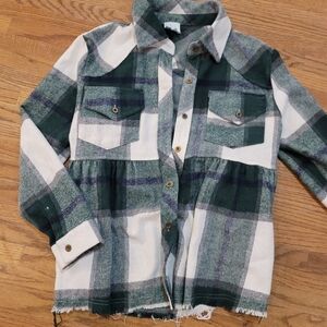 Plaid button down with cinched waist, raw hem, green highlights "shop the mint"